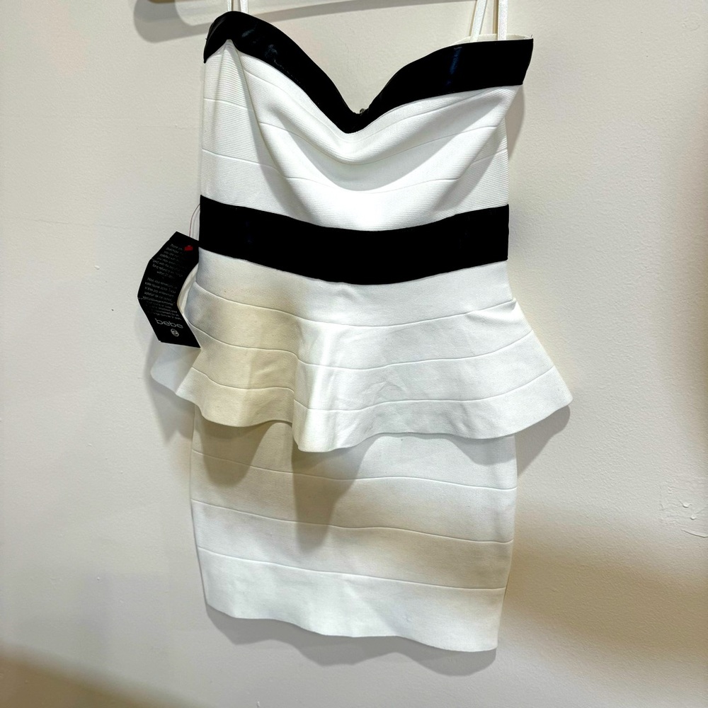 BeBe bandage peplum dress size small